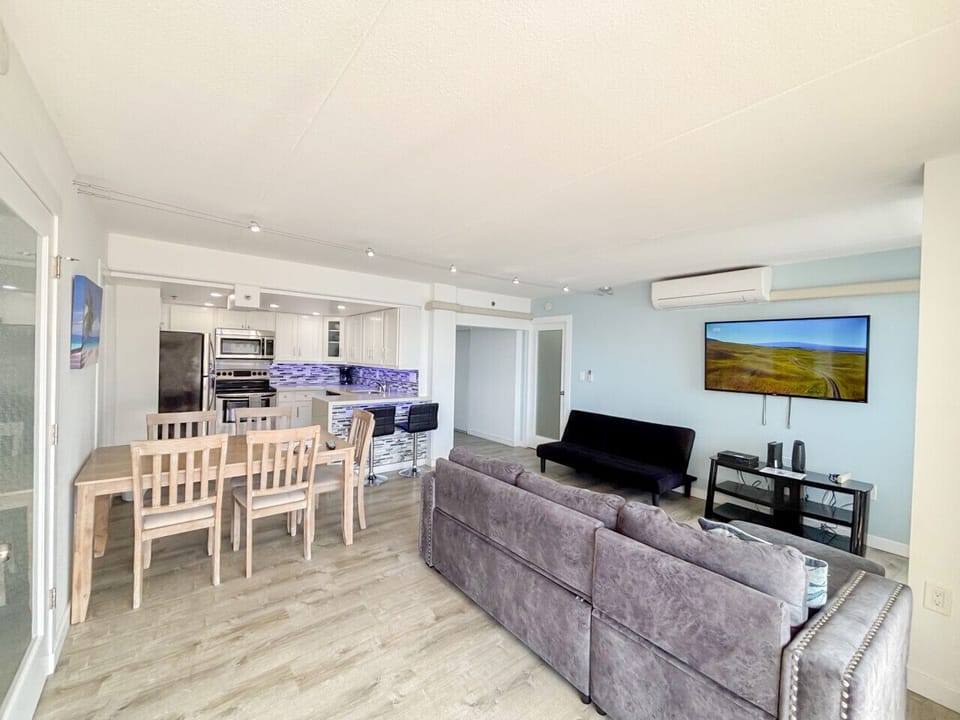 Spacious living area with TV