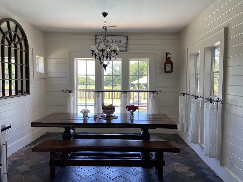 Kitchen table seats 8 but can easily seat 10 with additional chairs 