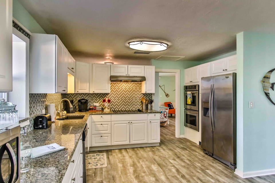 As you enter to your right is a huge kitchen!