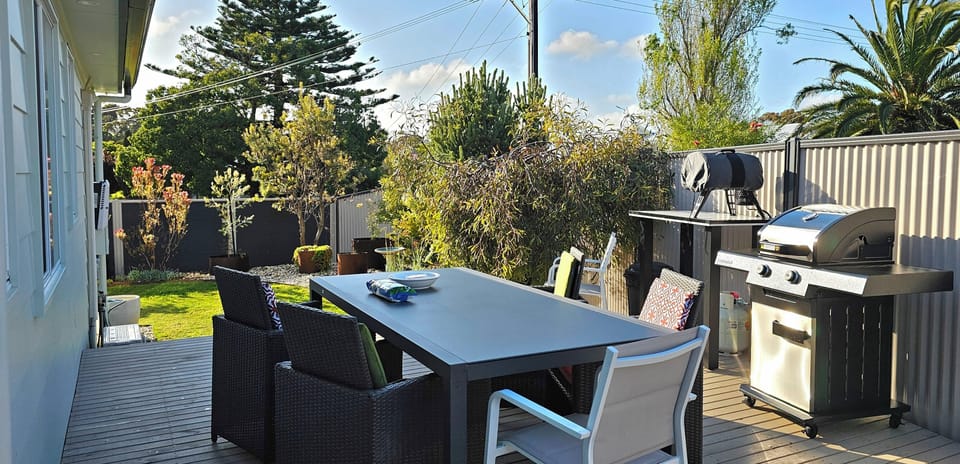 Outdoor Decking with large table and access to Butlers kitchen and house.