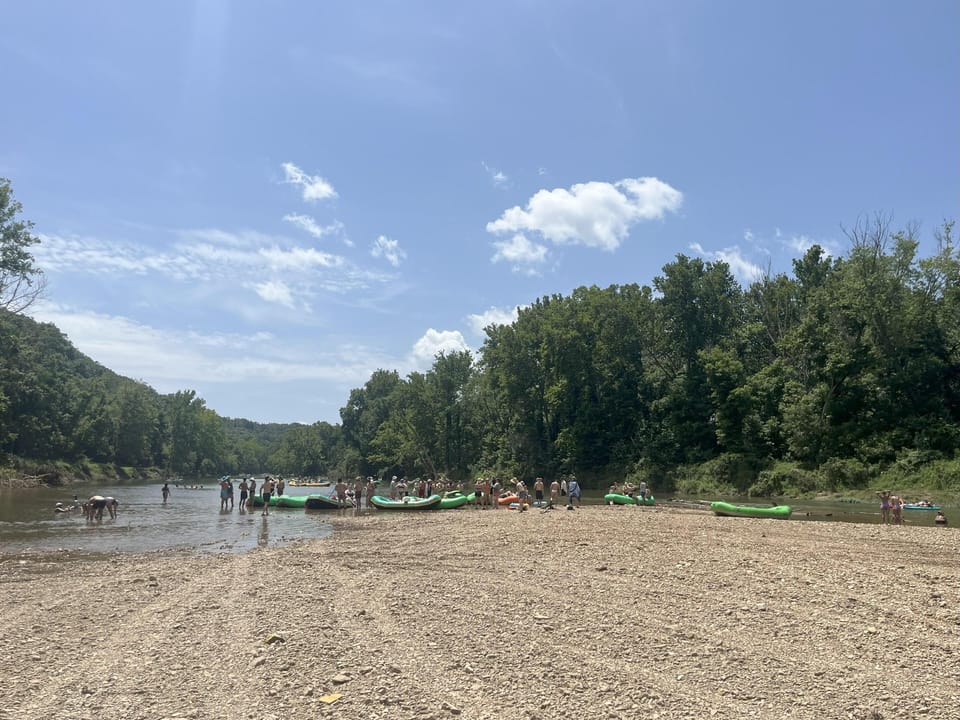 Upper end of 4J Gravel Bar showing floaters.  This Gravel Bar is 5.5 acres and has 1/2 mile of river frontage.  This area is accessed by paying a $30 per booking fee.  Tubes can be rented to float the 1/2 mile tube loop.