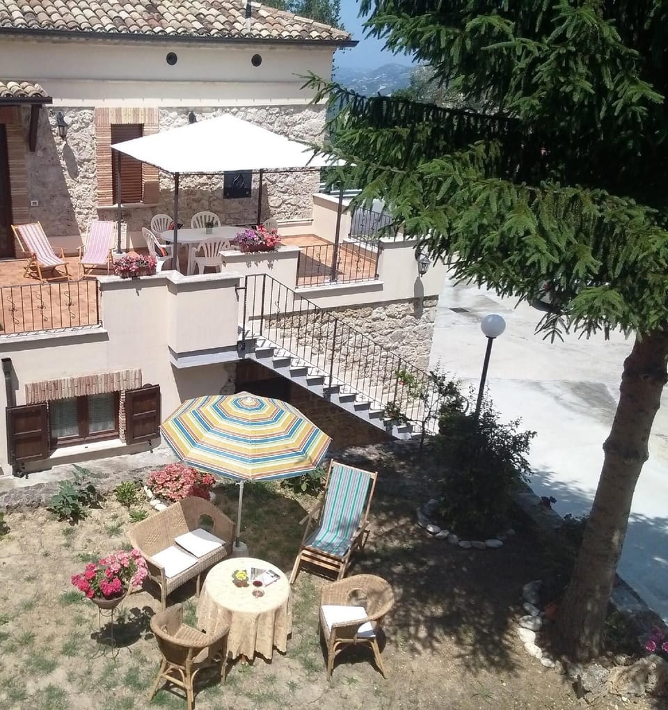 External view of the building. Private sun terrace and courtyard, with barbecue and other garden furnishings