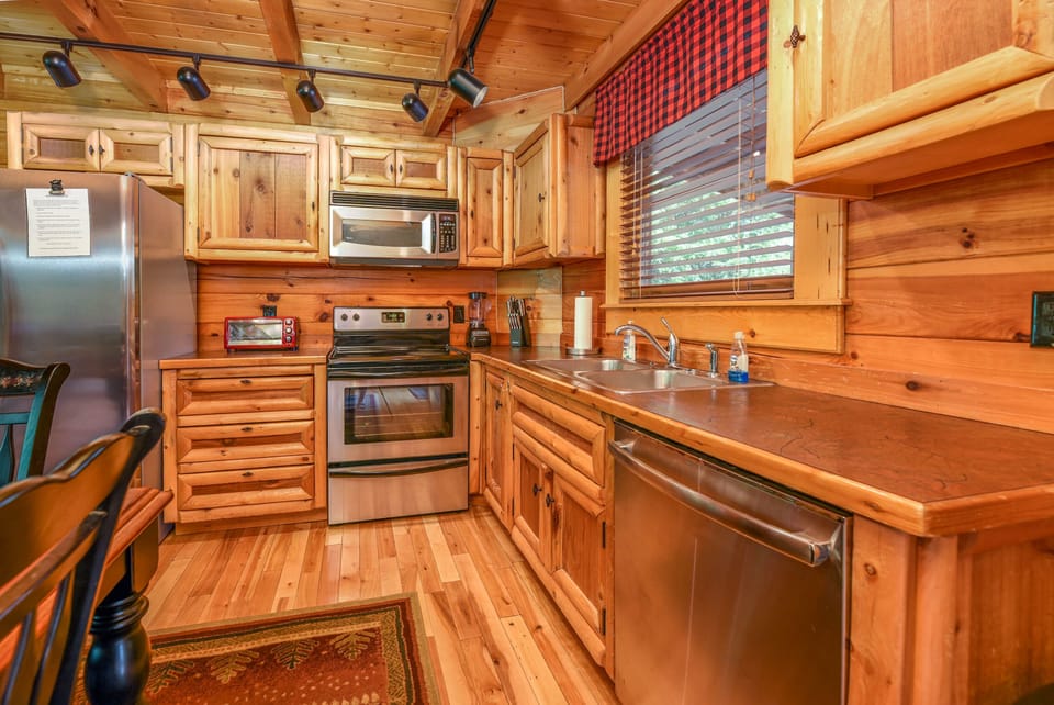 Fully stocked kitchen with plenty of amenities like blender and crockpot.