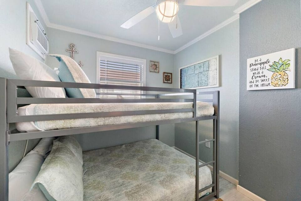 This bedroom has full bunk beds