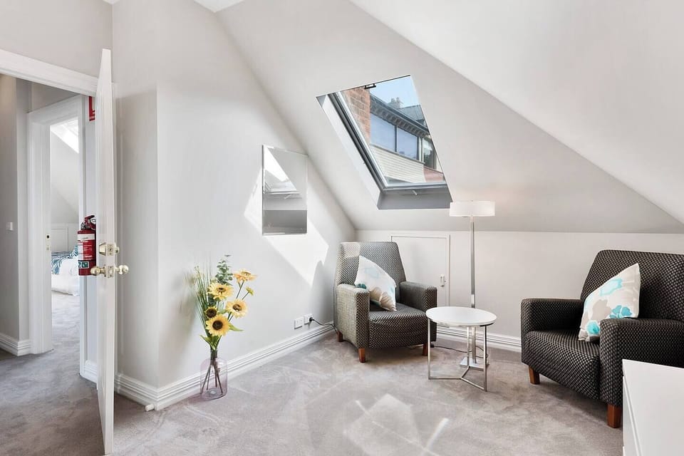 Bedroom four offers a cosy reading nook, perfect for flipping through the pages of your favourite book or casual conversation.