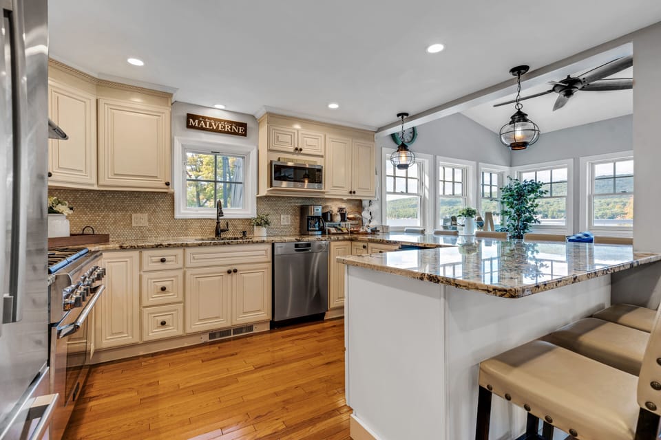 Gourmet kitchen with counter seating for 8
