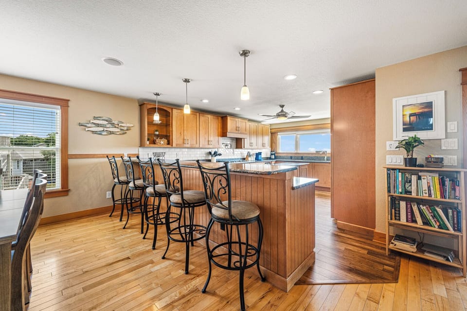 Gourmet Kitchen Area with Bar Seating and Views of the Sound