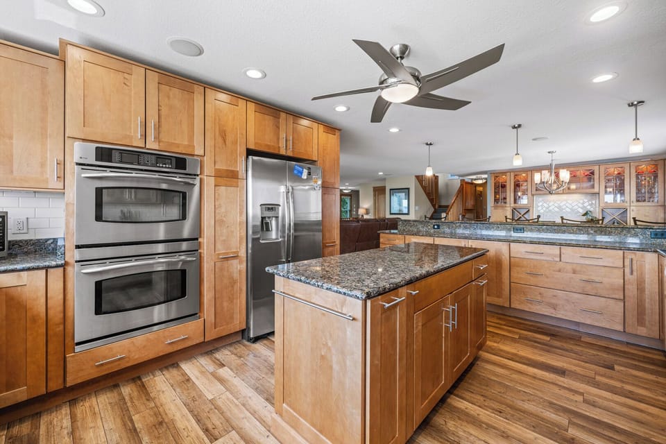 Gourmet Kitchen Area with Bar Seating and Views of the Sound