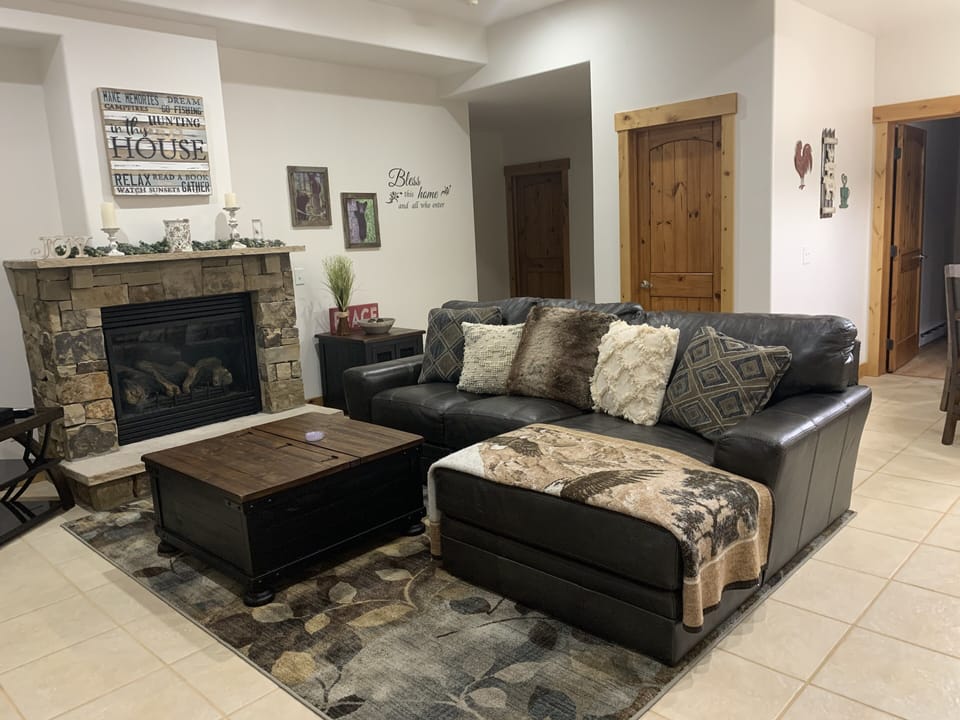 Living room with gas fireplace. 