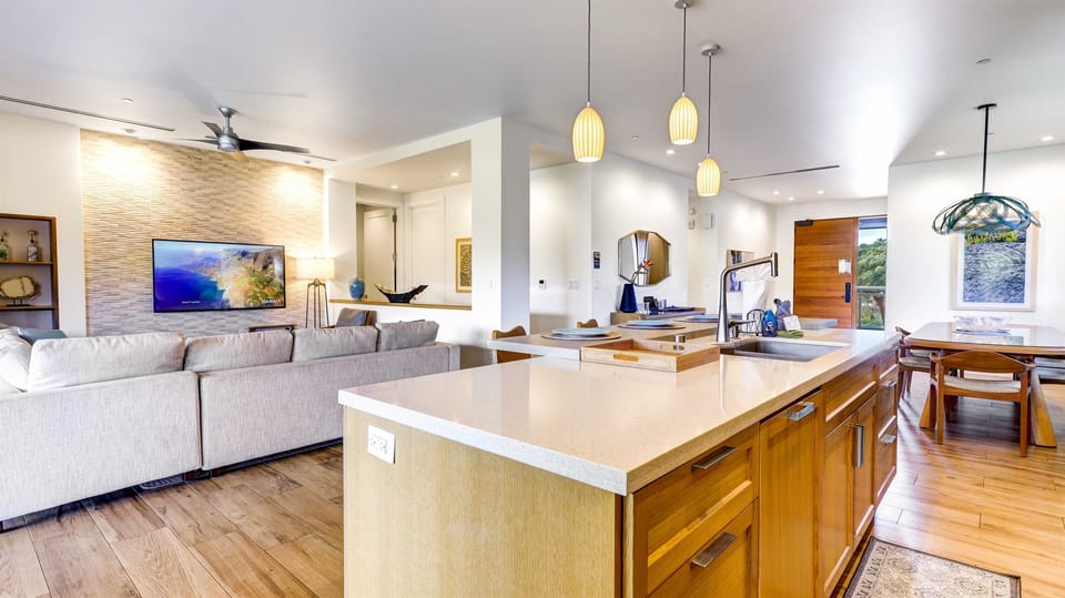 Keep the chef company at the beautiful granite top island with bar seating