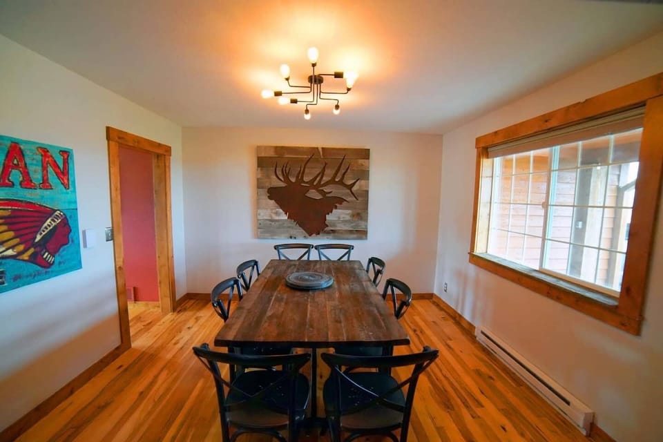 How great is this formal dining room - table sits 8-10 with room for more at the kitchen table.