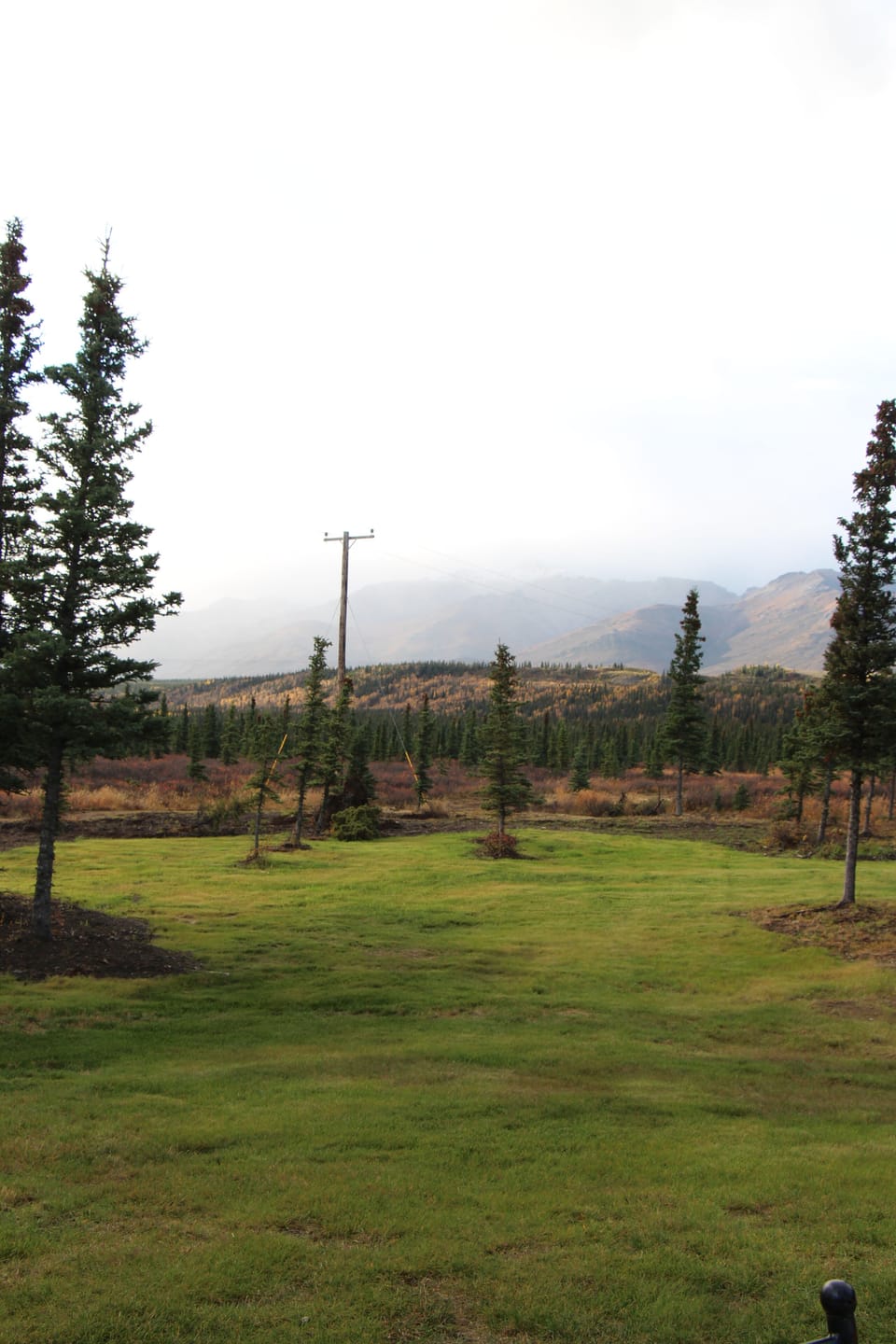 There are no neighbors directly south of the home, only mountains and woodlands.