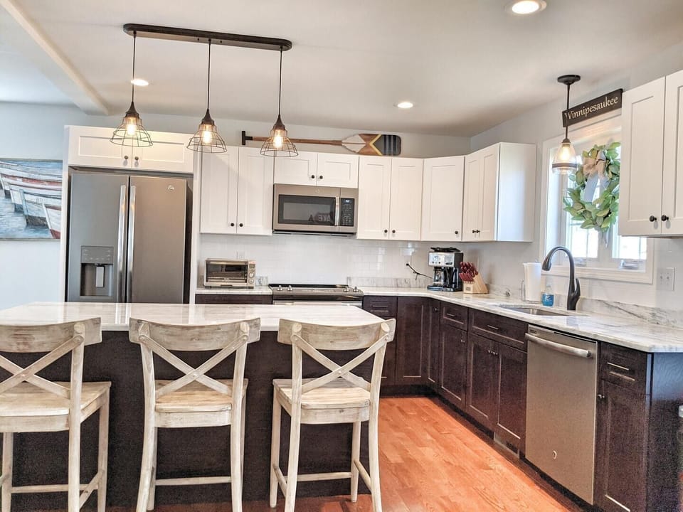 Upstairs, second floor; has a great sunny Kitchen
