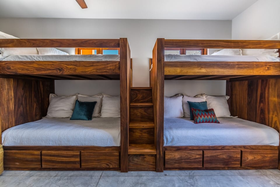 4 extra long twins with one trundle (sleeps 5) Private entry/exit door, own bath