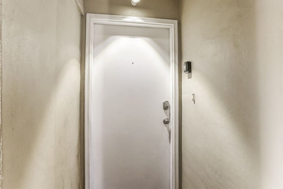 Lighted Front Door at Ketch Courtyard 102