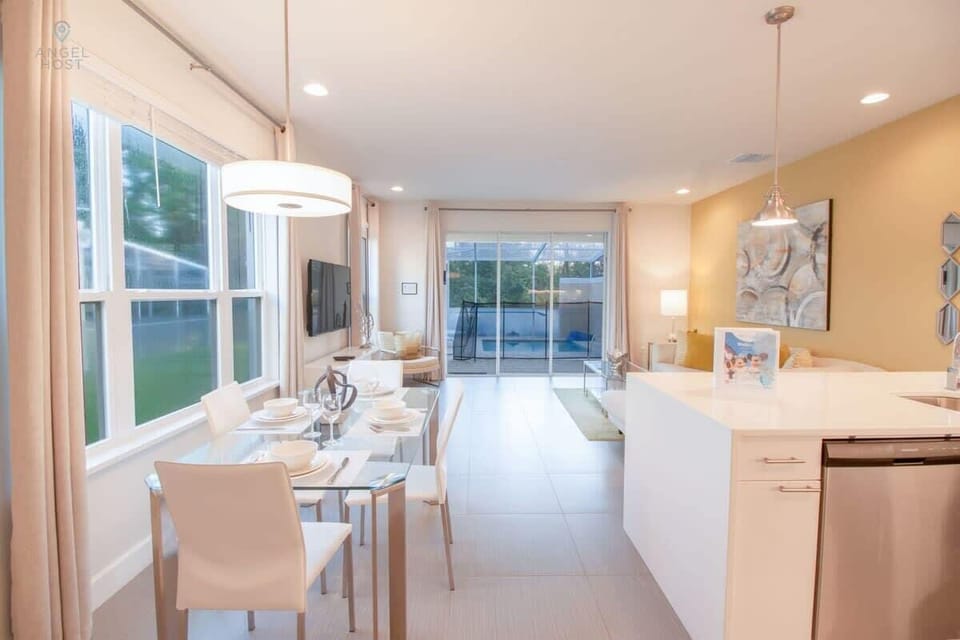 Enjoy a front-to-back view upon entry, plus dining for six.