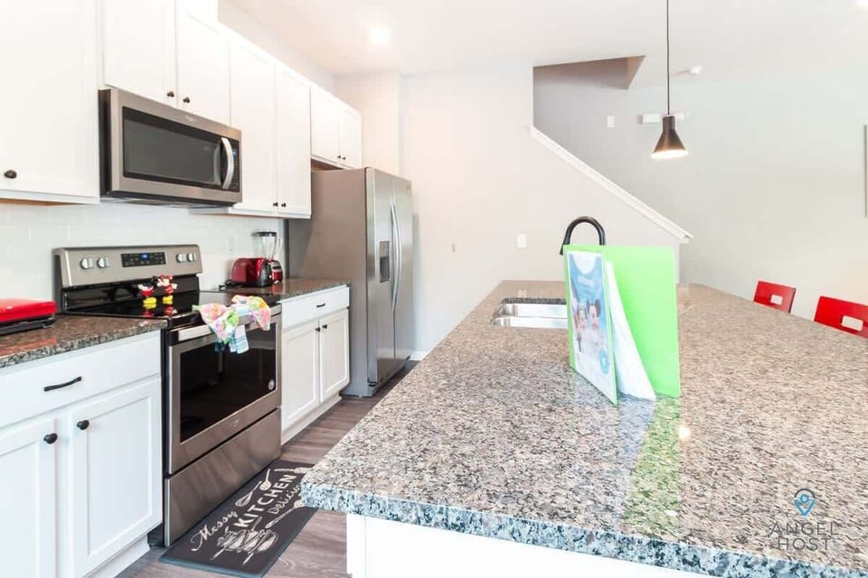 Large modern fully-equipped kitchen for home-cooked meals.