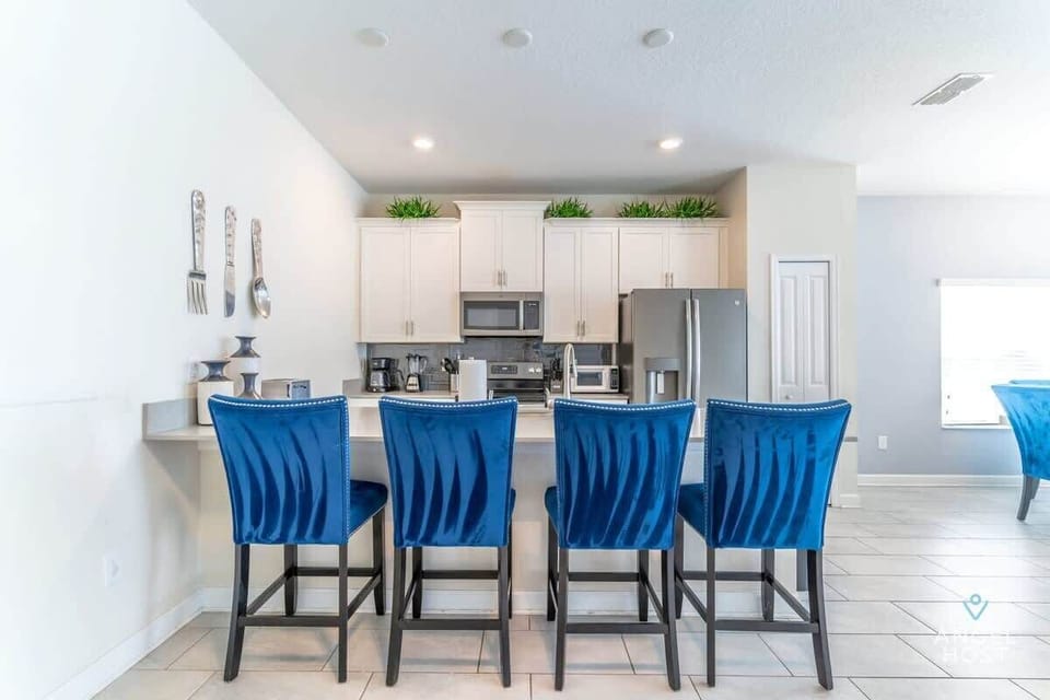 Kitchen bar with stools, perfect for casual dining or chatting.