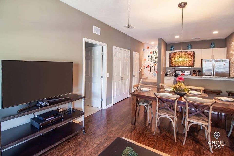 Open-concept dining and living area - perfect for meals or movie nights.