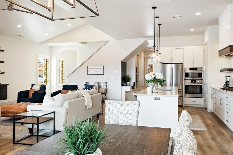 Open concept kitchen, dining, and living areas allow groups to gather comfortably