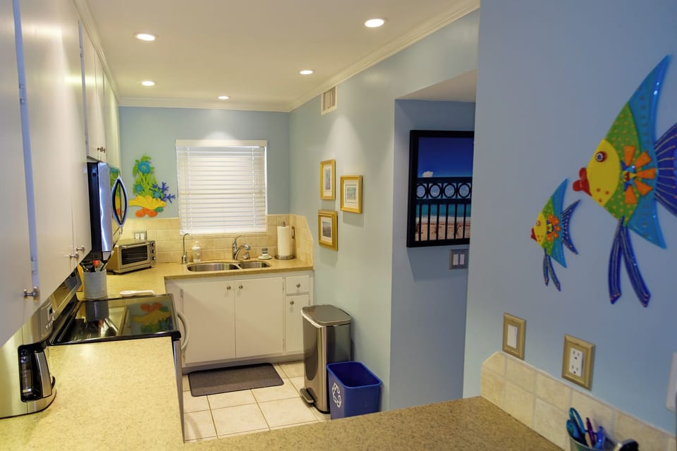 Kitchen viewed from dining area. You'll enjoy preparing meals here!