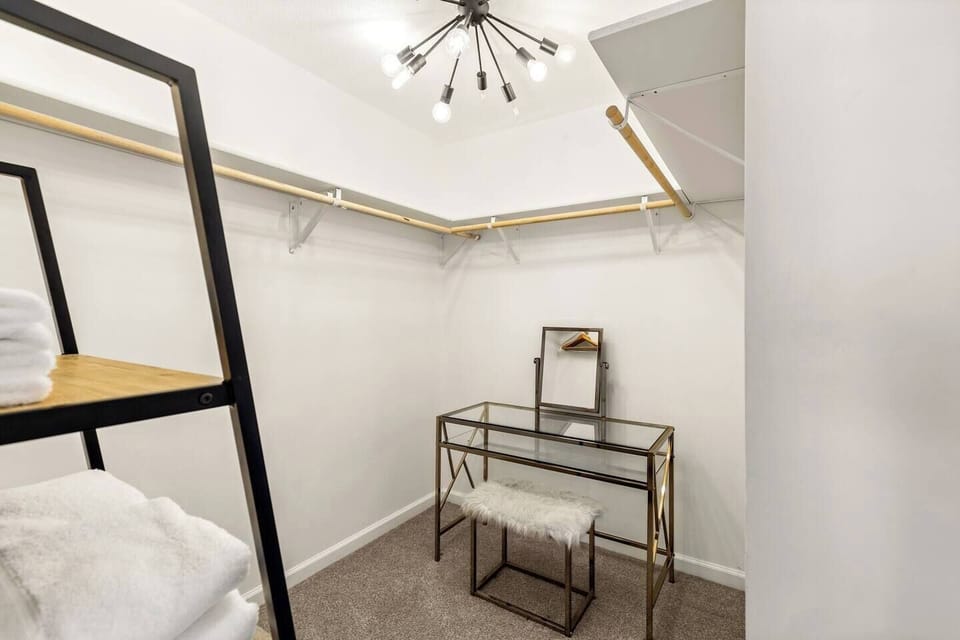 The upstairs primary bedroom has a large Walk-In Closet with make-up vanity. Get ready in style!