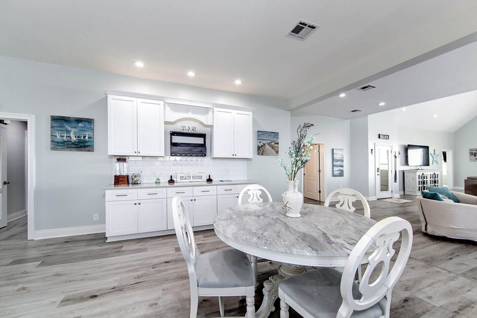 Beautiful open dining area. Dry bar included.