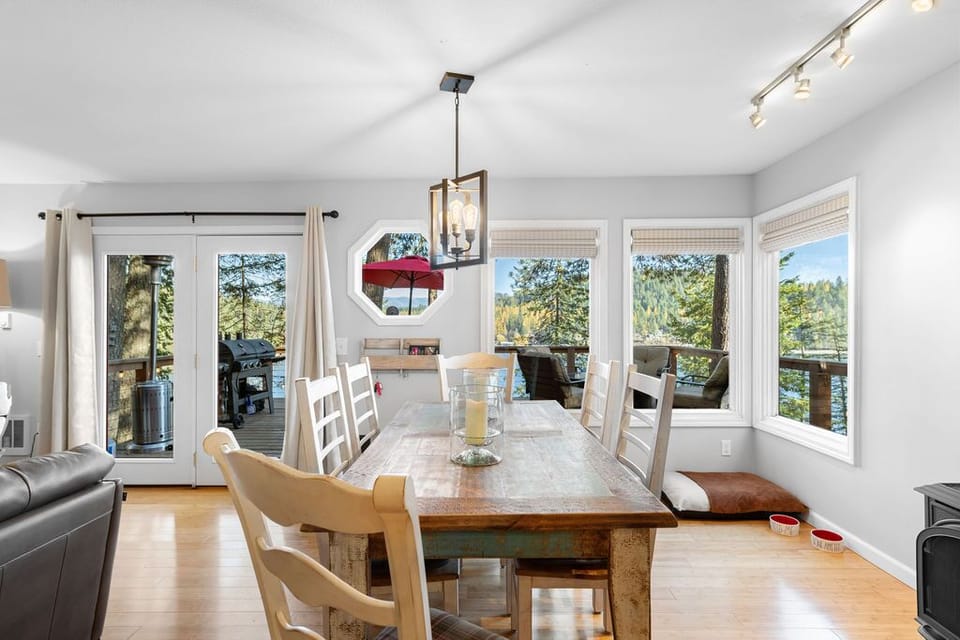 Seating for six at the dining table with incredible lake views