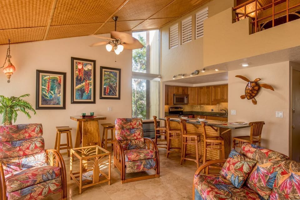 Loft, bamboo ceilings, and tropical fans