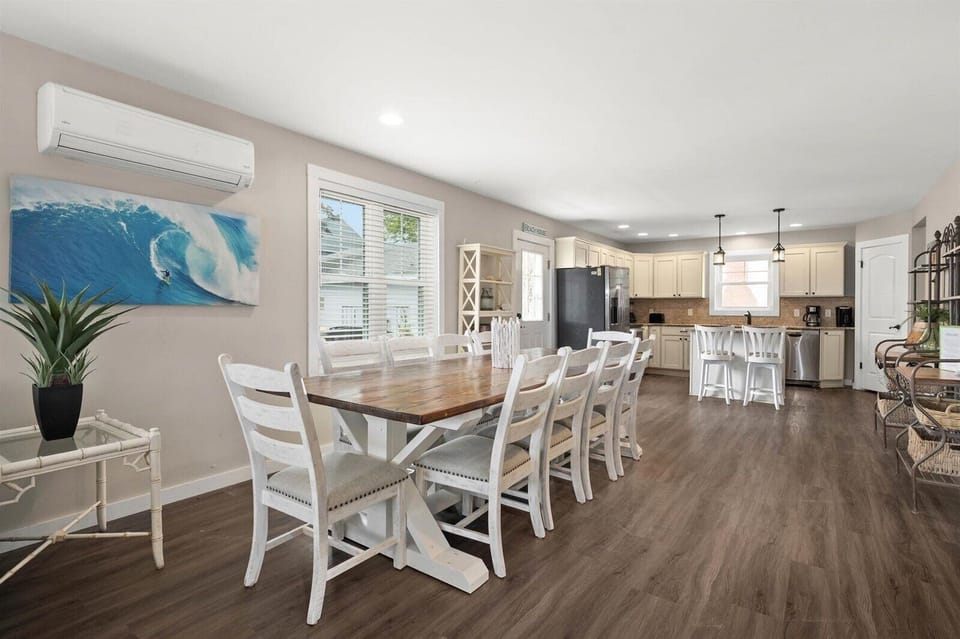 Dining area with barn wood table and chairs for 10