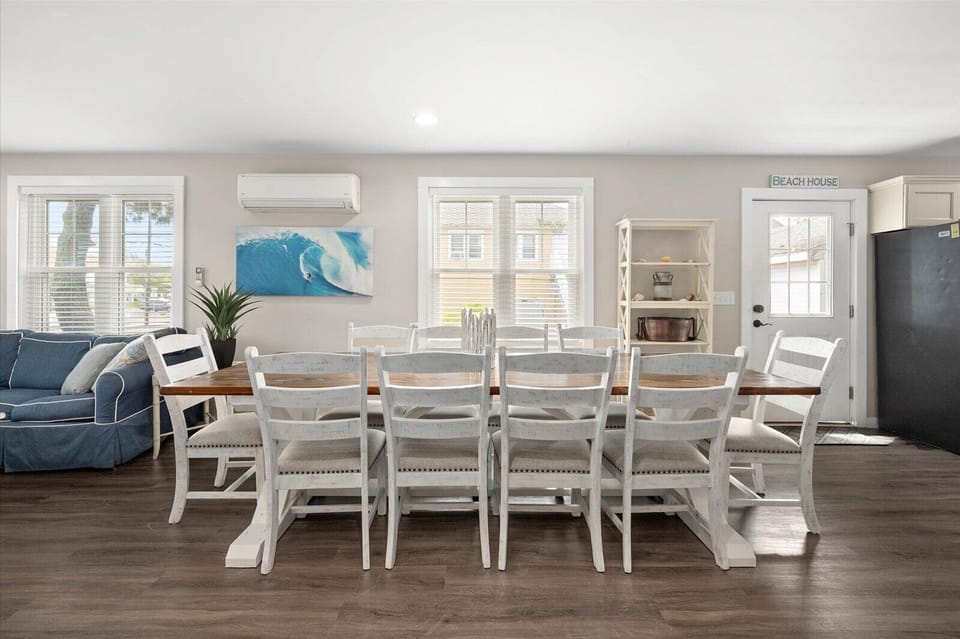 Dining area with barn wood table and chairs for 10