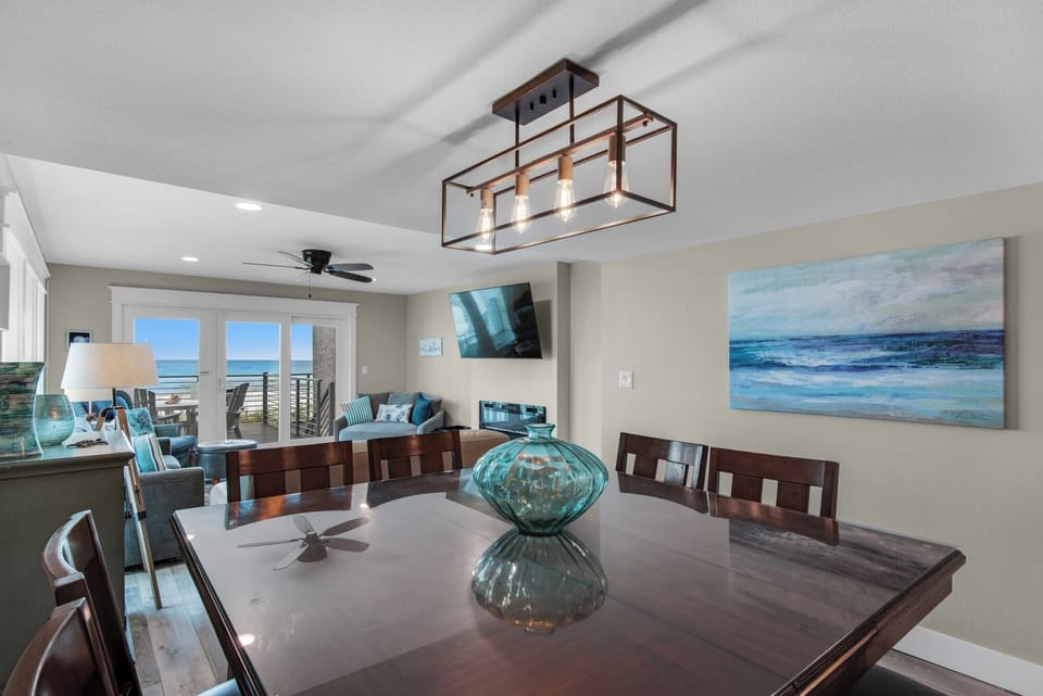 Cabinet full of books, games, and puzzles for fun before and after mealtime.