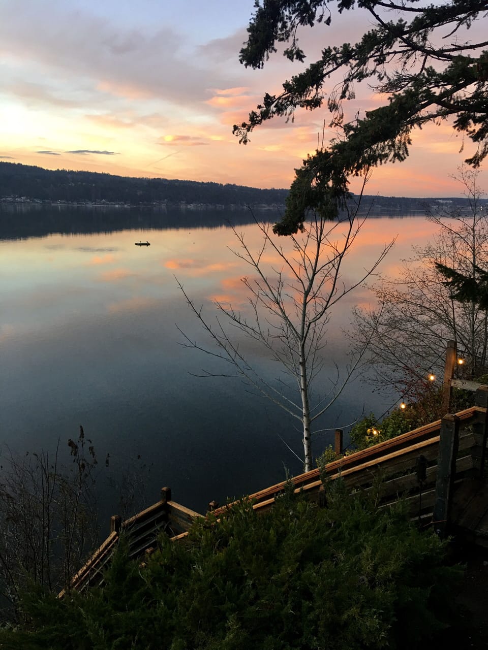 The beach stairs are located on the NW corner of the property