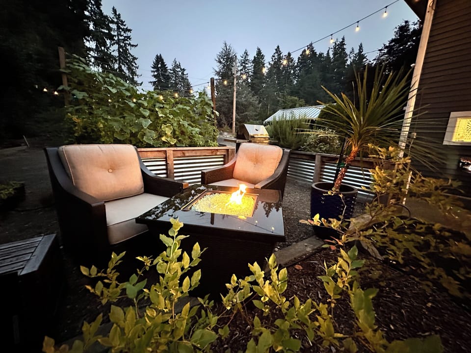 Step outside & fire up the grill while enjoying the warmth of the fire table.  