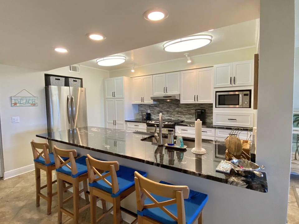 Beautiful kitchen stainless steel appliances and granite countertops 