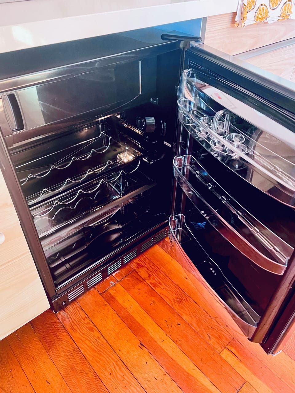 Mini fridge with top freezer, drink rack, fruit drawers