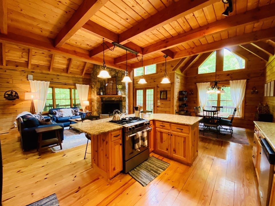 Fully open main level with kitchen, dining, gathering room