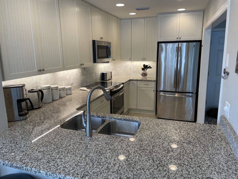  View of spacious kitchen with plenty of counter space for the perfect meal