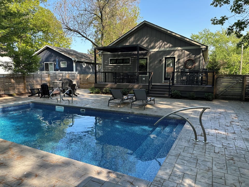 Large deck, heated pool,  huge courtyard for games with grill & fire pit.