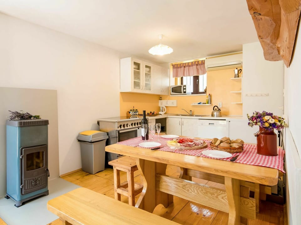 Table, Property, Furniture, Wood, Cabinetry, Interior Design, Window, Kitchen, Floor, Flooring