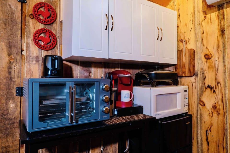 [Kitchenette, Upstairs] A fully equipped kitchenette with air fryer, coffee (K-cups included), microwave and mini-refrigerator.
