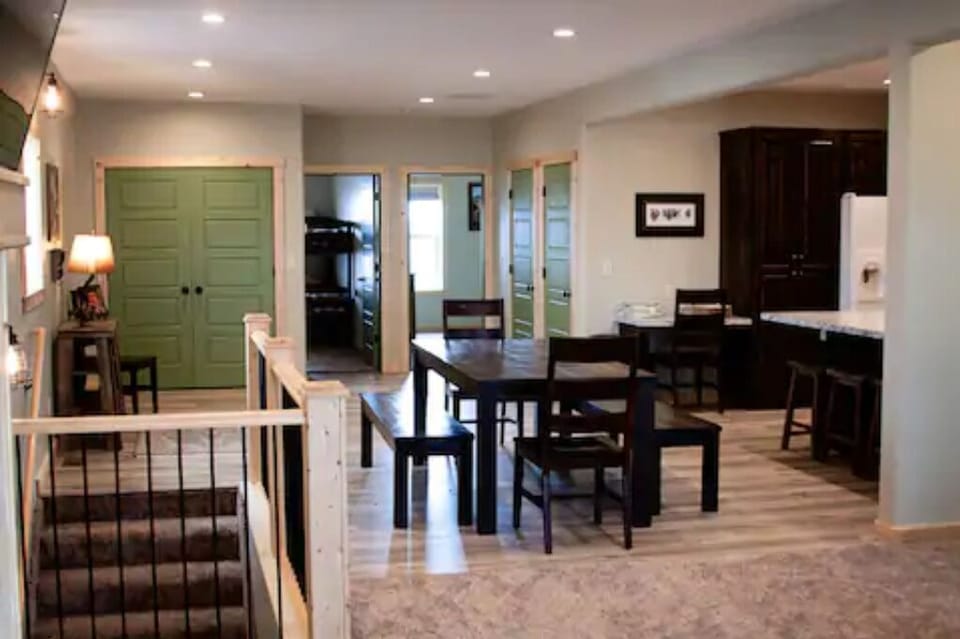 dining area with master bedroom & 2nd bedroom in background