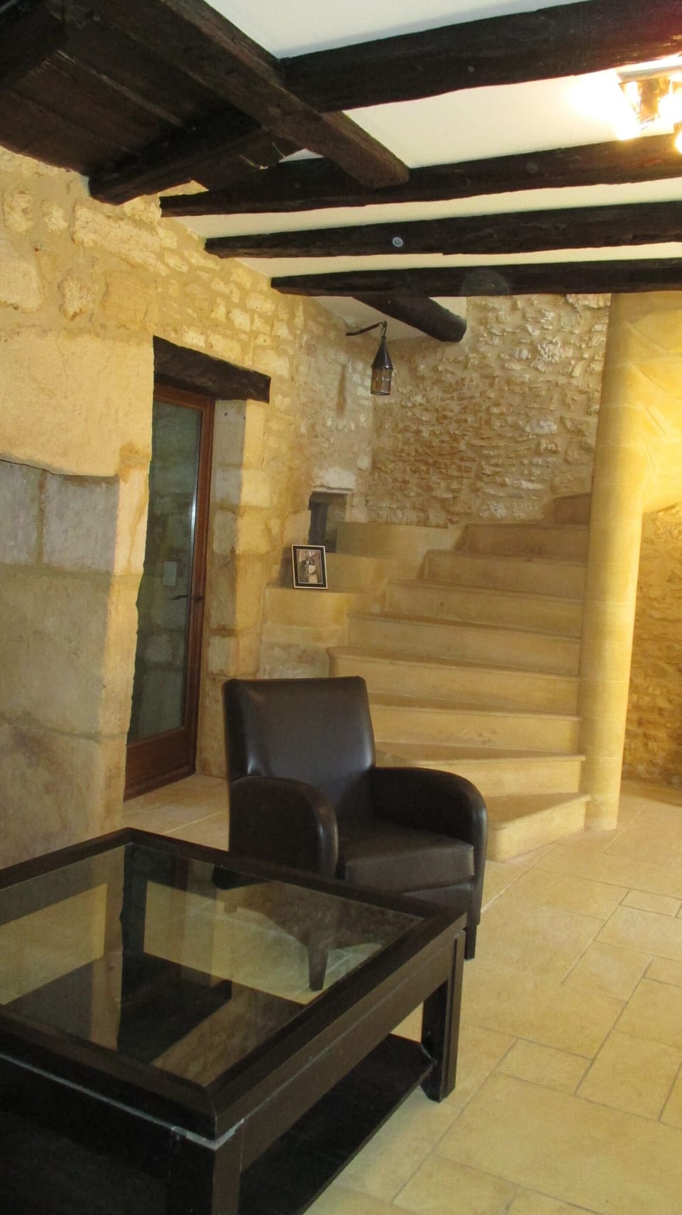 Atmospheric bureau with stone staircase and wine cellar. 
