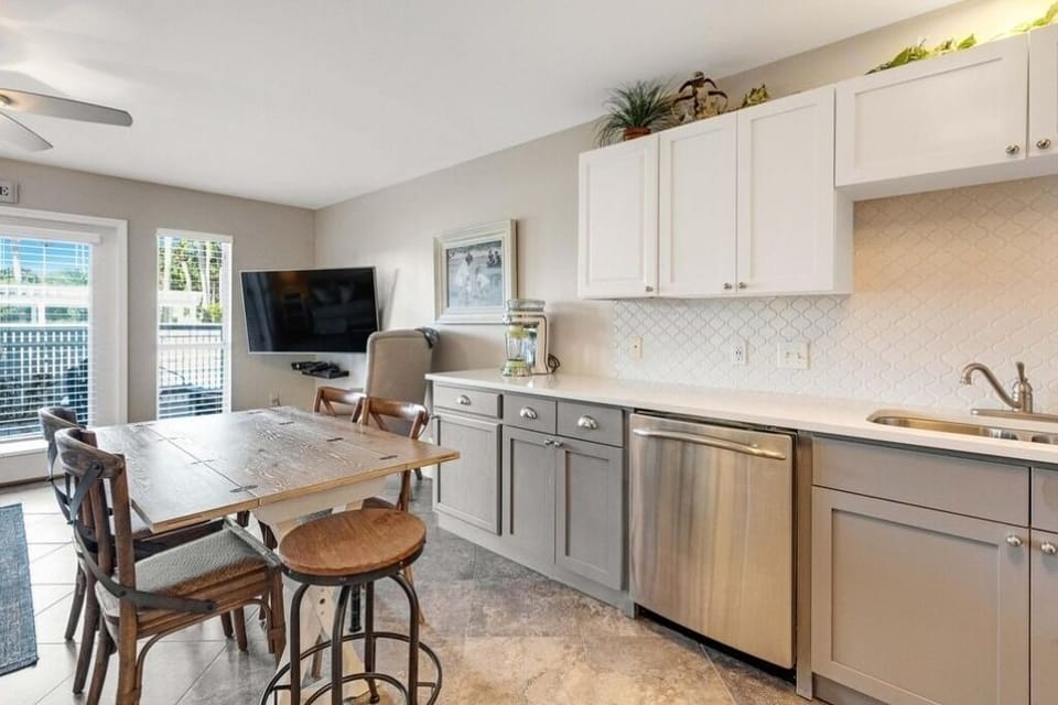 Custom kitchen with extra counter space, seating for 6