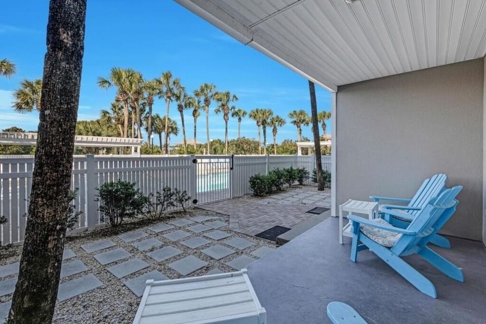 Large patio with 4 adirondacks