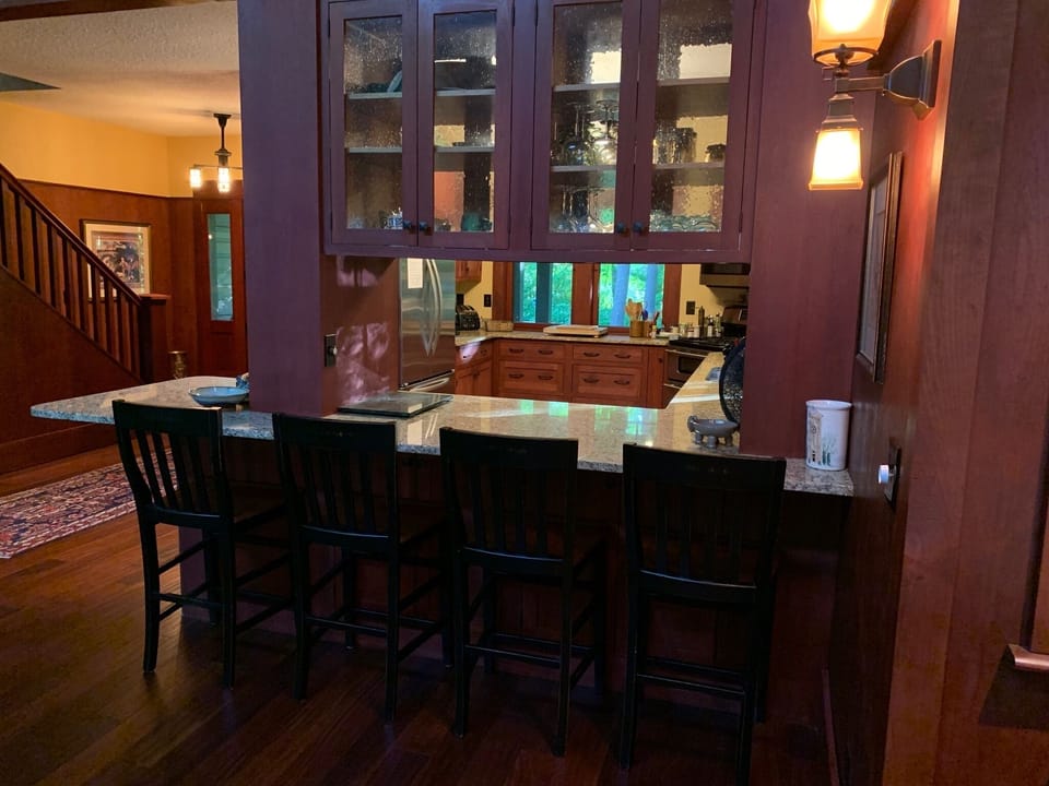 Dining adjoins Kitchen with breakfast bar seating.