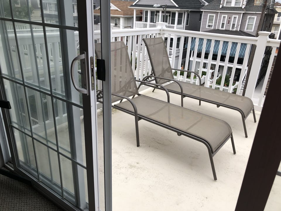 Lounge chairs on balcony 