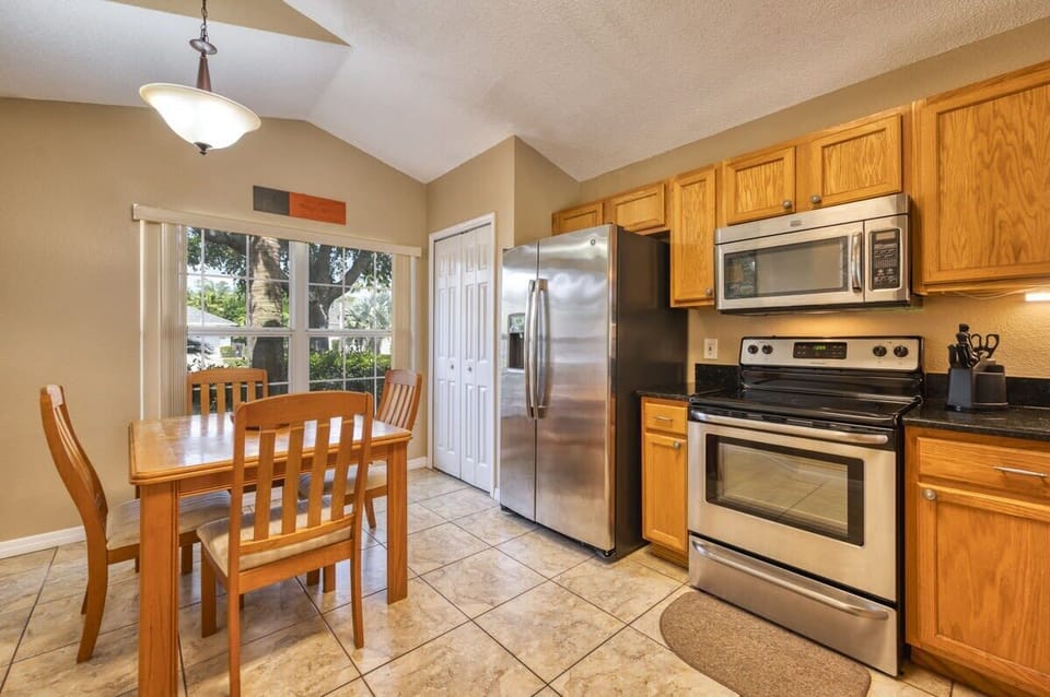 A fully-equipped kitchen for home-cooked meals and kitchen table for 4.