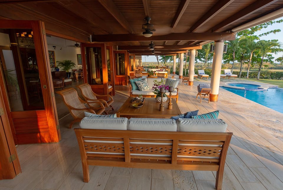 Covered terrace overlooking the pool