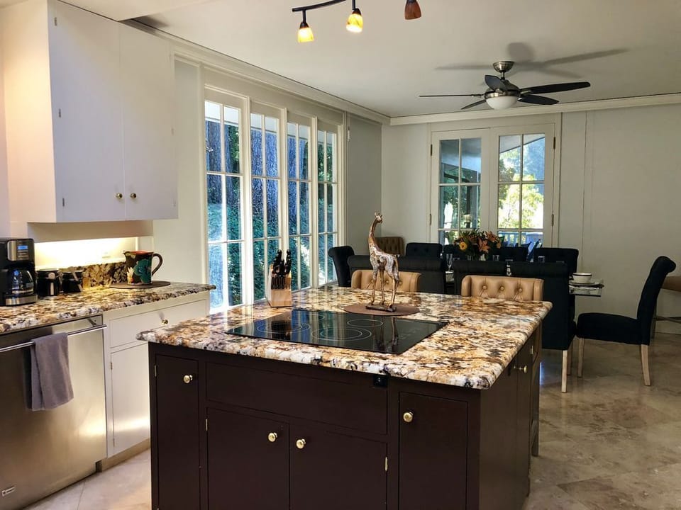 Giraffe Kitchen , dining has since been move.  This now the family room with TV 